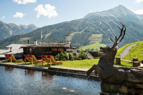 Отель MONDI Bellevue Alm Gastein  Бад-Гаштайн